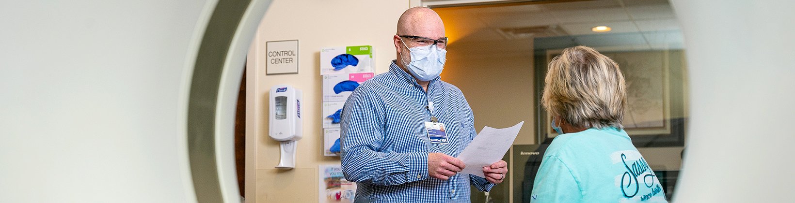 Nurse navigator Shawn Perkins meets with a patient